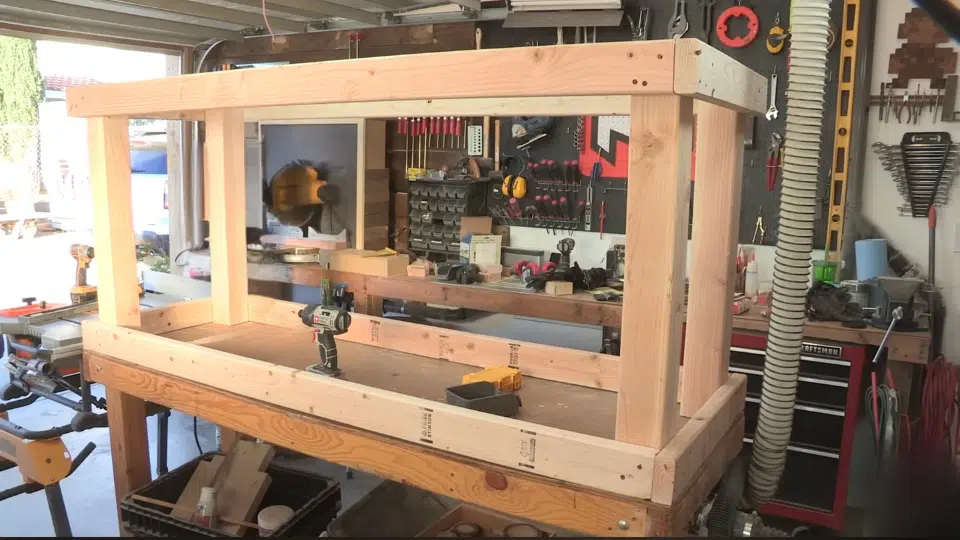 assembling the frame to build a diy workbench