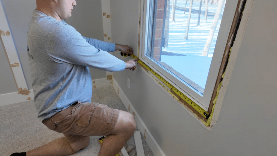 step 2 measure and cut the bottom trim to install craftsman style window trim