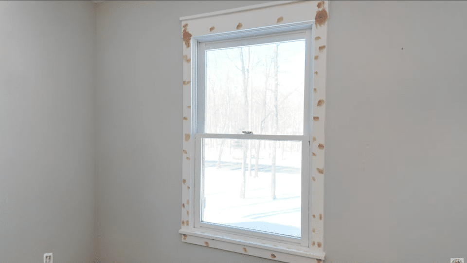 step 6 fill caulk and sand to install craftsman style window trim