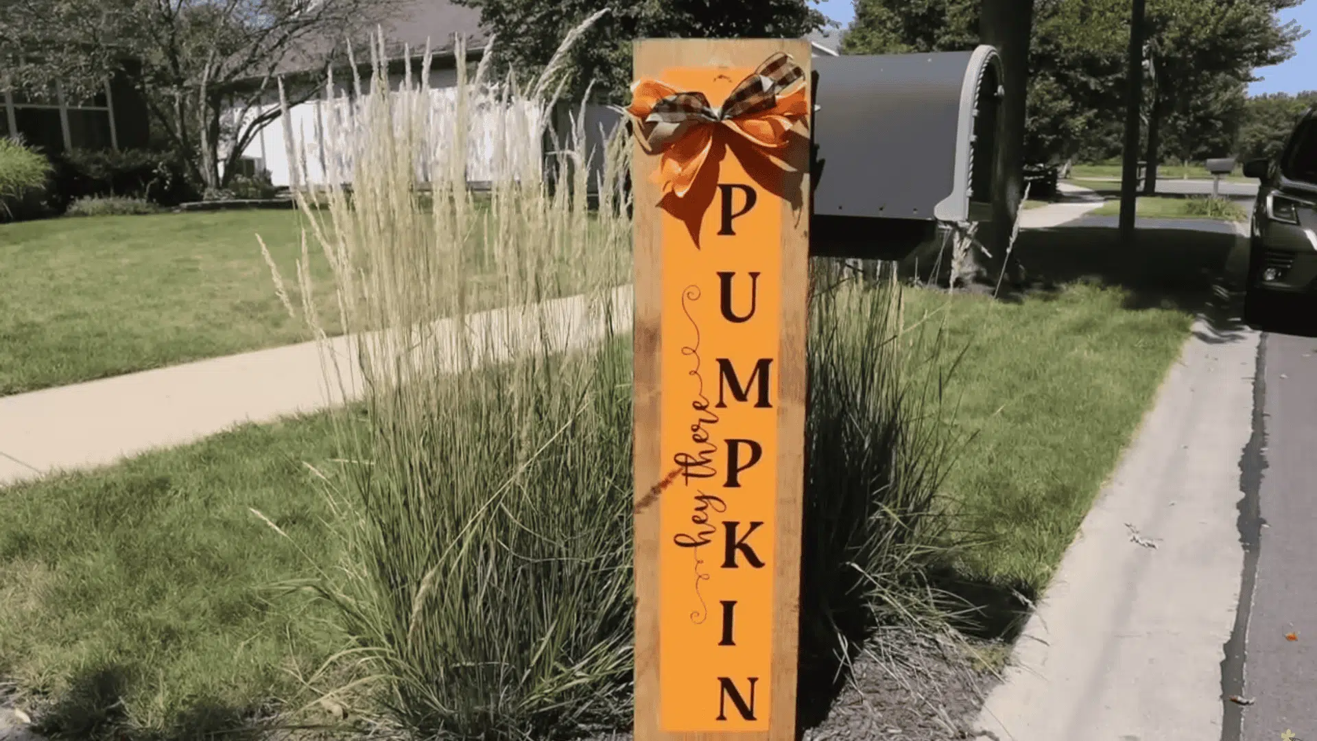 reversible tall sign pumpkin and haunted mansion