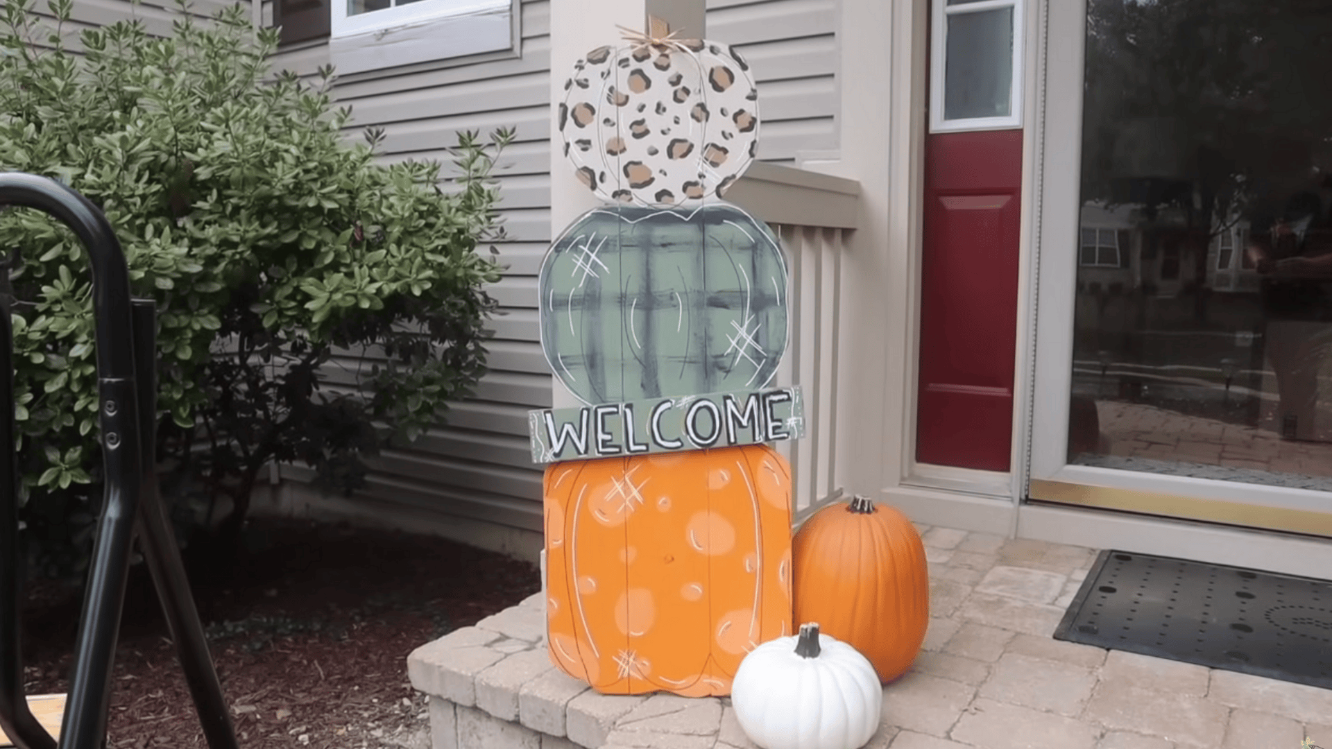 stacked porch pumpkins
